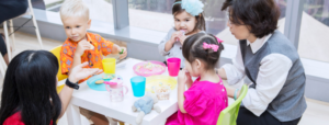twos year olds at table